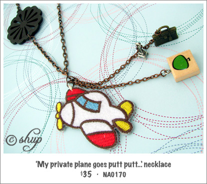NA0170 - 'My private plane goes putt, putt...' necklace